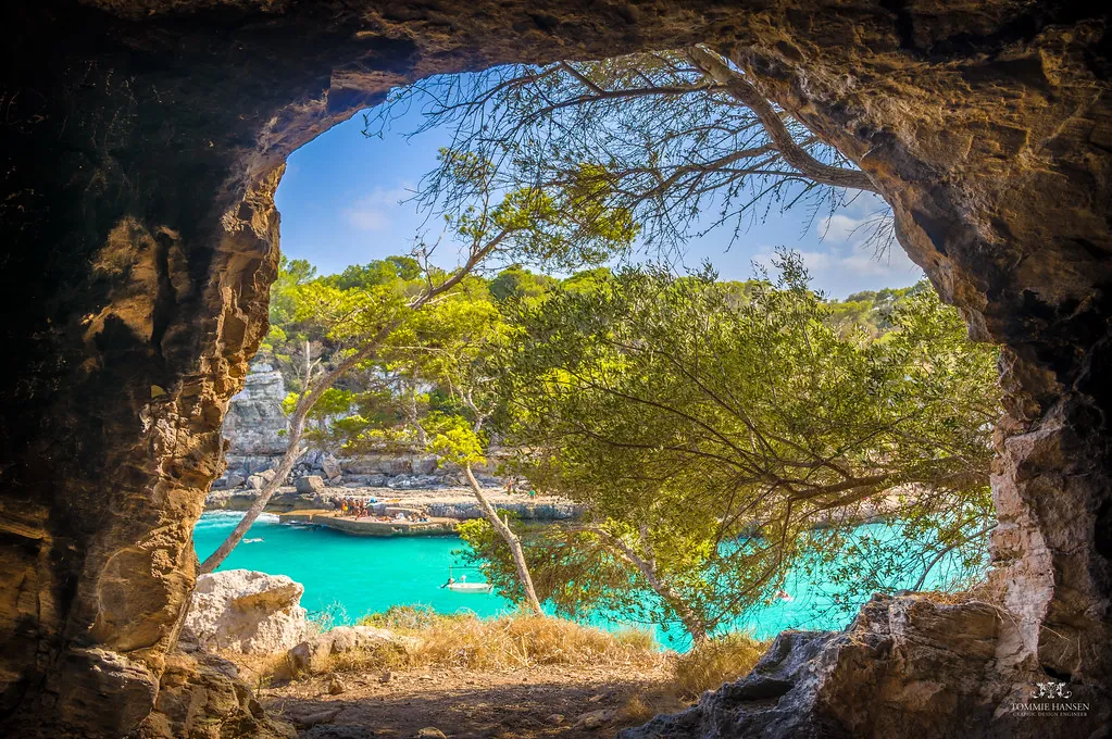 Looking out from a cave in Cala Llombards beach, Mallorca (Spain)